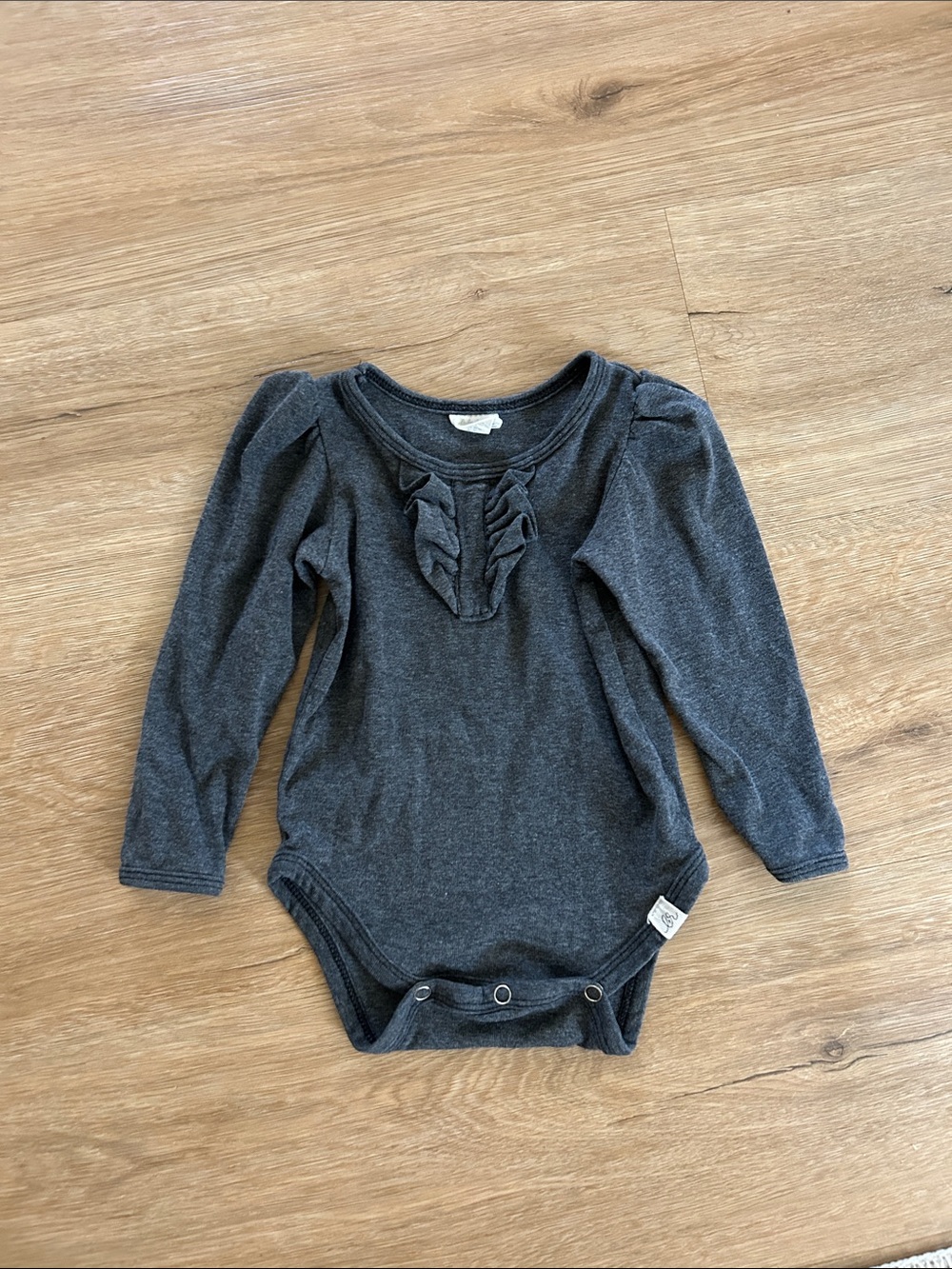 Charcoal Ruffle Long-Sleeve Baby One-Piece Bodysuit